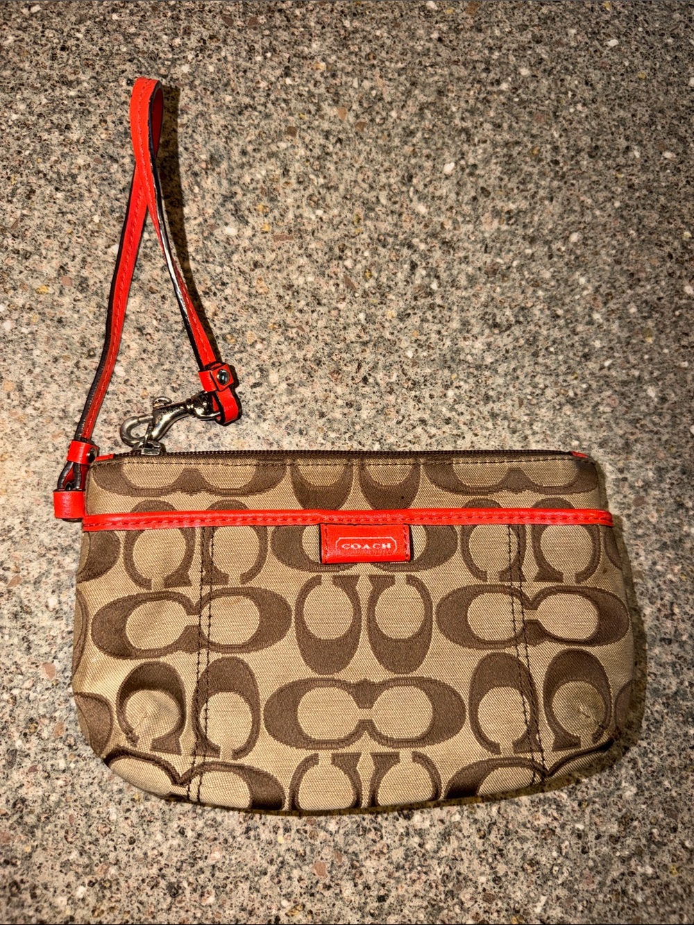 COACH Signature Canvas Wristlet in Brown with Orange Trim